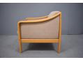Striped fabric upholstered armchair made in Denmark with beech frame. 