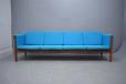 Long and comfortable 4 seat sofa with visible rosewood frame. Ap stolen 1965