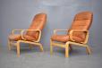 A stylish armchair with comfortable supportive seat fittred into the beech frame