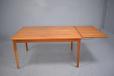 Midcentury teak dining table with hidden draw leaves  - view 8