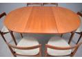Extended table now comfortable to seat 6. Extends with fold-out leaf hidden in table