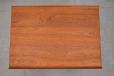 Vintage teak coffee table with raised lip edges designed by Finn Juhl