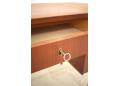 The drawer above the knee hole can be locked. 1 key supplied.