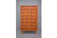 Large 8 drawer chest in vintage teak with carved pull handles