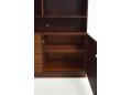The base unit contains 4 drawers & a cupboard door with adjustable shelf.