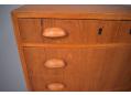 Teak chest of 8 drawers with cup handles made in Denmark.