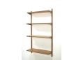 The unit contains 3 shelves at 30cm deep & 1 shelf at 26cm deep.