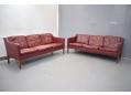 Pair of matching 3 seat burgundy leather sofas for sale.