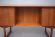 open storage space on the back means the desk could be used free standing to great effect