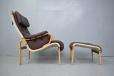 Nielaus Mobelfabrik brown leather armchair with beech frame 