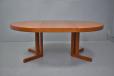 Vintage round top dining table with pedestal legs designed 1968 by Johannes Andersen