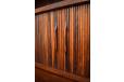 The tambour doors slide with easy and are all SOLID rosewood staves