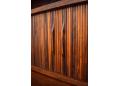 The tambour doors slide with easy and are all SOLID rosewood staves