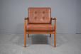 Minimalist midcentury Danish armchair in teak and brown leather, model 119 designed by Ole Wanscher