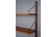 Modular wall mounted storage system in teak designed by Poul Cadovius - view 11