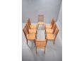 Produced by Mogens Kold in teak with orignal papercord woven seats.