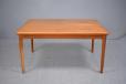 Midcentury teak dining table with hidden draw leaves  - view 2
