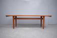 Teak large design lounge table with visible mortice joins & tapering legs.