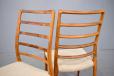 High ladder back dining chairs in vintage rosewood model no 82 designed by Niels O Moller