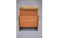 Solid panel frames are construced from staved teak timber as evident by the end grain visible on the sides.