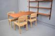 1947 Design royal system in vintage teak with 4 shelves, cabinet and dining table