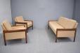 Compact frame Danish design 3 seat sofa with dark wood show frame.