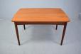 Vintage teak compact dining table with 2 pull out leaves