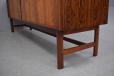 midcentury minimalist rosewood sideboard with sliding tambour doors designed 1965 by Henry Rosengren Hansen
