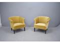Pair of matching club chairs with low backs, 1950s design.