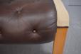 Dark brown leather buttoned footstool made in Denmark