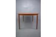 Midcentury teak dining table designed in the 1960s and produced by Danish Mobelfabrik