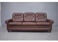 Original leather upholstered 1970s 3 seat sofa in chocolate brown.