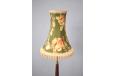 small shade with floral pattern is original for the lamp