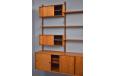 Modular teak shelving system designed in 1947 by Poul Cadovius