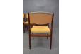 Upholstered back has lead edge to secure the upholstery and create a clean line where the upholstery meets
