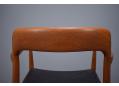 Back rest in solid teak is soft to touch and gently curved from single piece