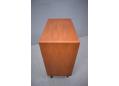 6 drawer teak chest with lipped handles.