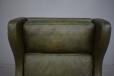 Classic wingback armchair in original green leather - view 8