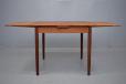 Midcentury teak dining table with square top produced by Danish Mobelfabrik