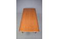 The narrow rectangular shape is perfect for a modest dining room or as a breakfast table in the kitchen