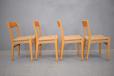Vintage beech frame dining chairs with woven papercord seats made by Dux Sweden