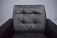 1960s Swivel base armchair in original black leather upholstery