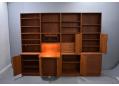 The unit consists of 4 base cabinets and 8 top cabinets which are all modular.