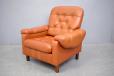 Vintage orange leather armchair made by Danish Mobelfabrik