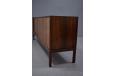 Lovely rish and dark rosewood across this practical low sideboard