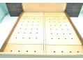 Laminated birch ply base with air holes and hinged to access storage