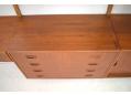 Drawer storage cabinet on Danish wallmounted system in teak.