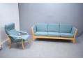 Low back modern 3 seat sofa with beech frame ends for sale.
