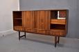 Vintage rosewood sideboard with sliding doors designed by E.W. Bach and produced by Sejling Skabe