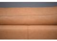 Skalma sofa upholstered in all leather in a caramel colour.